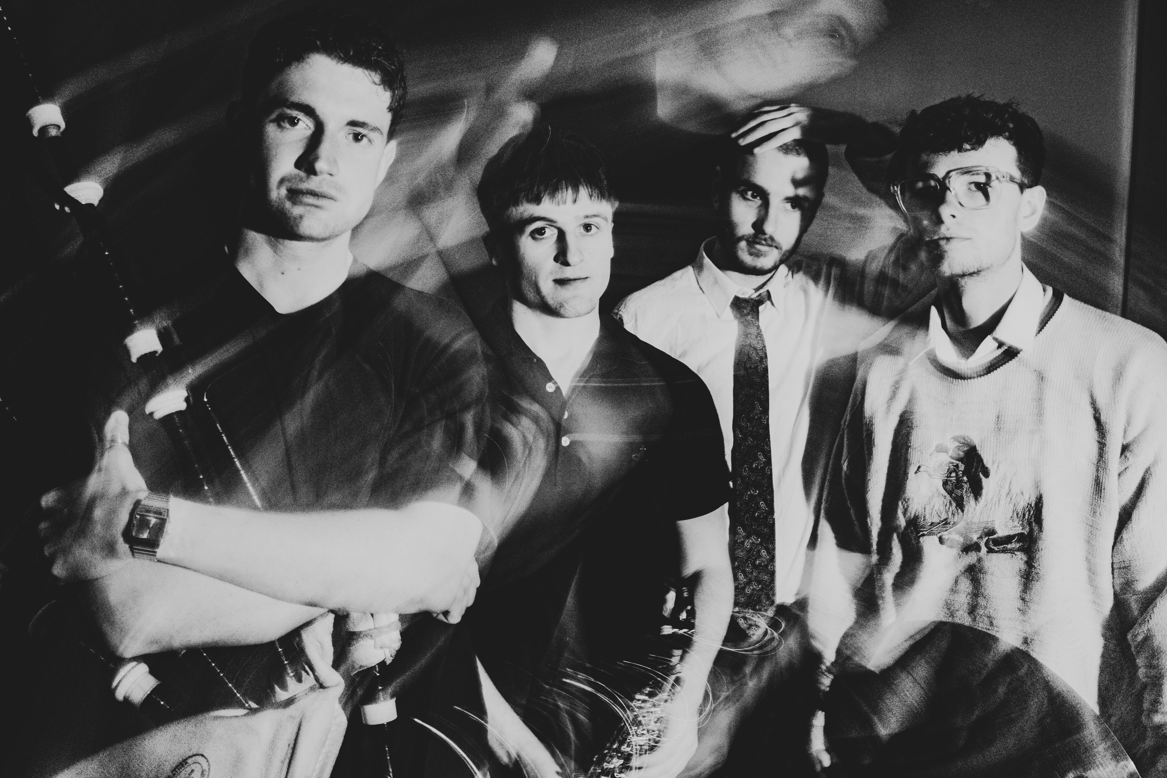 The Nexus Project members in black and white